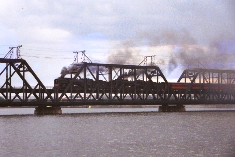 QJ 6988 crossing the Mississippi at Davenport, IA